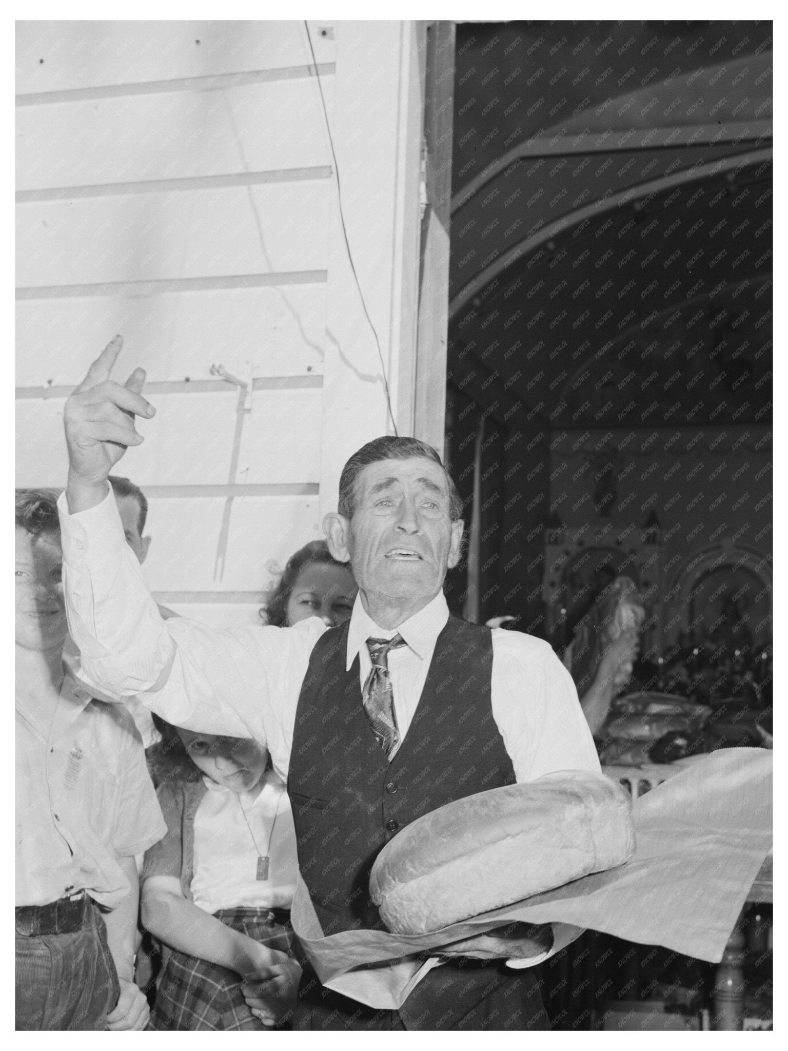 Auctioneer at Fiesta of the Holy Ghost Santa Clara 1942 - Available at KNOWOL