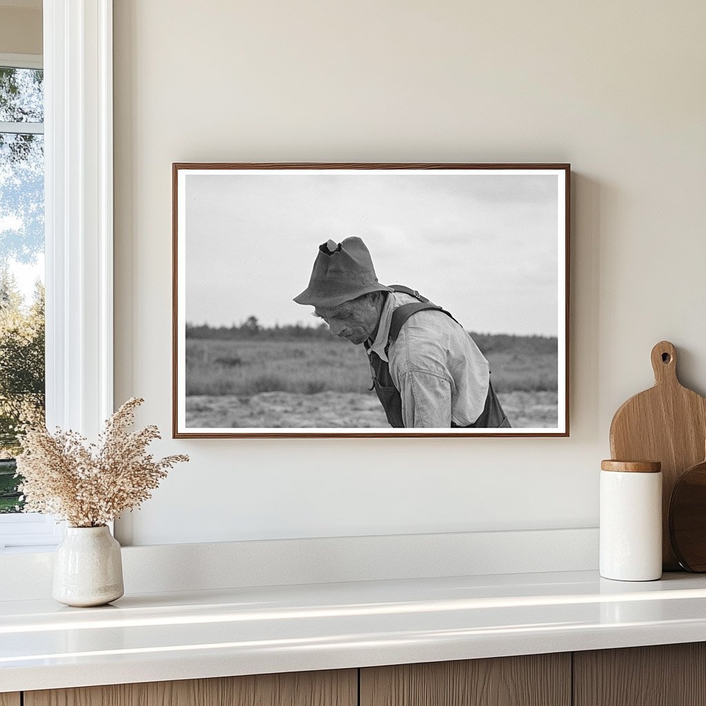 Ben Johnson Farming in Cut - Over Lands Wisconsin 1937 - Available at KNOWOL