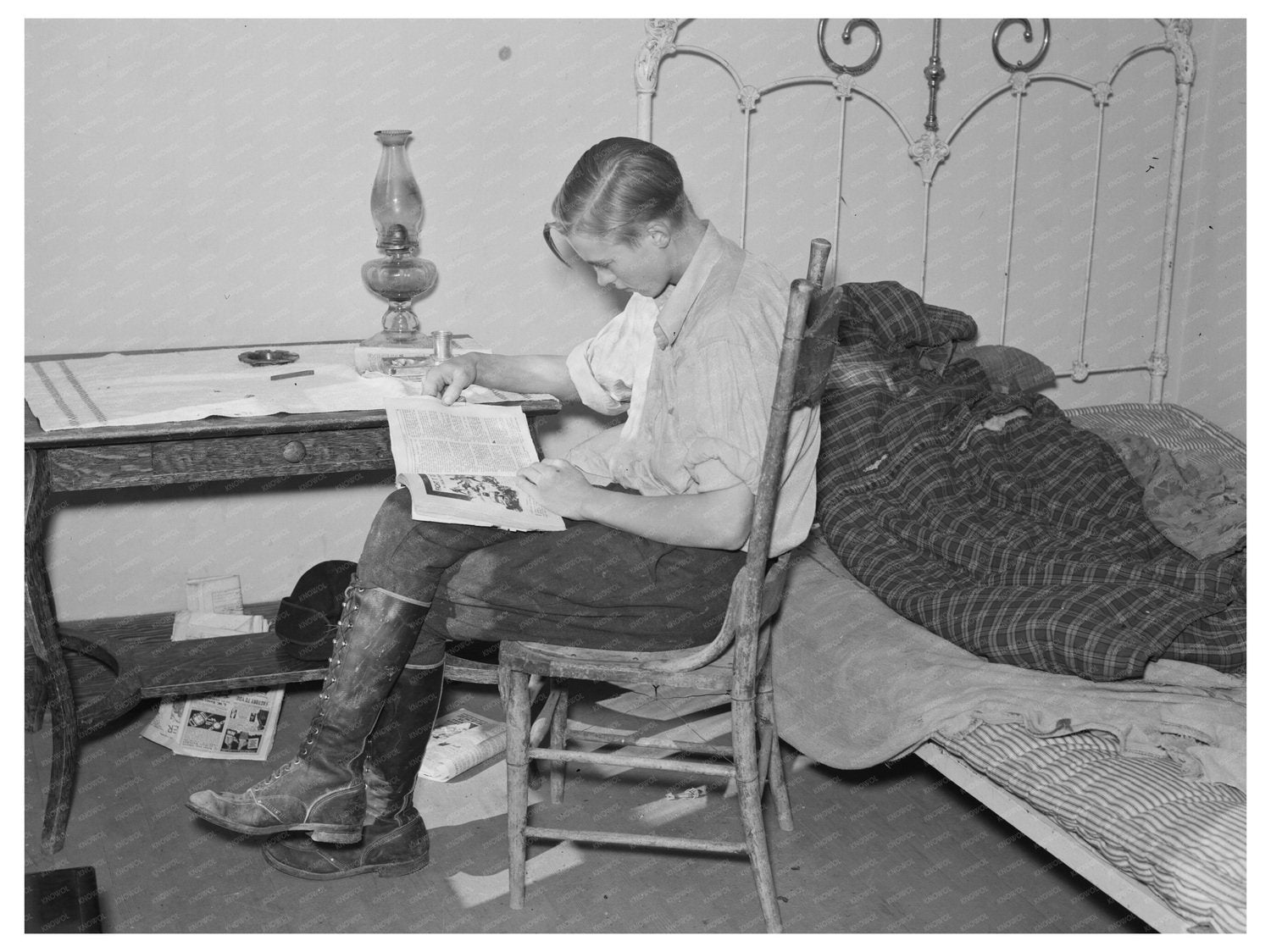 Boy Reading in Modest Bedroom North Dakota 1937 - Available at KNOWOL