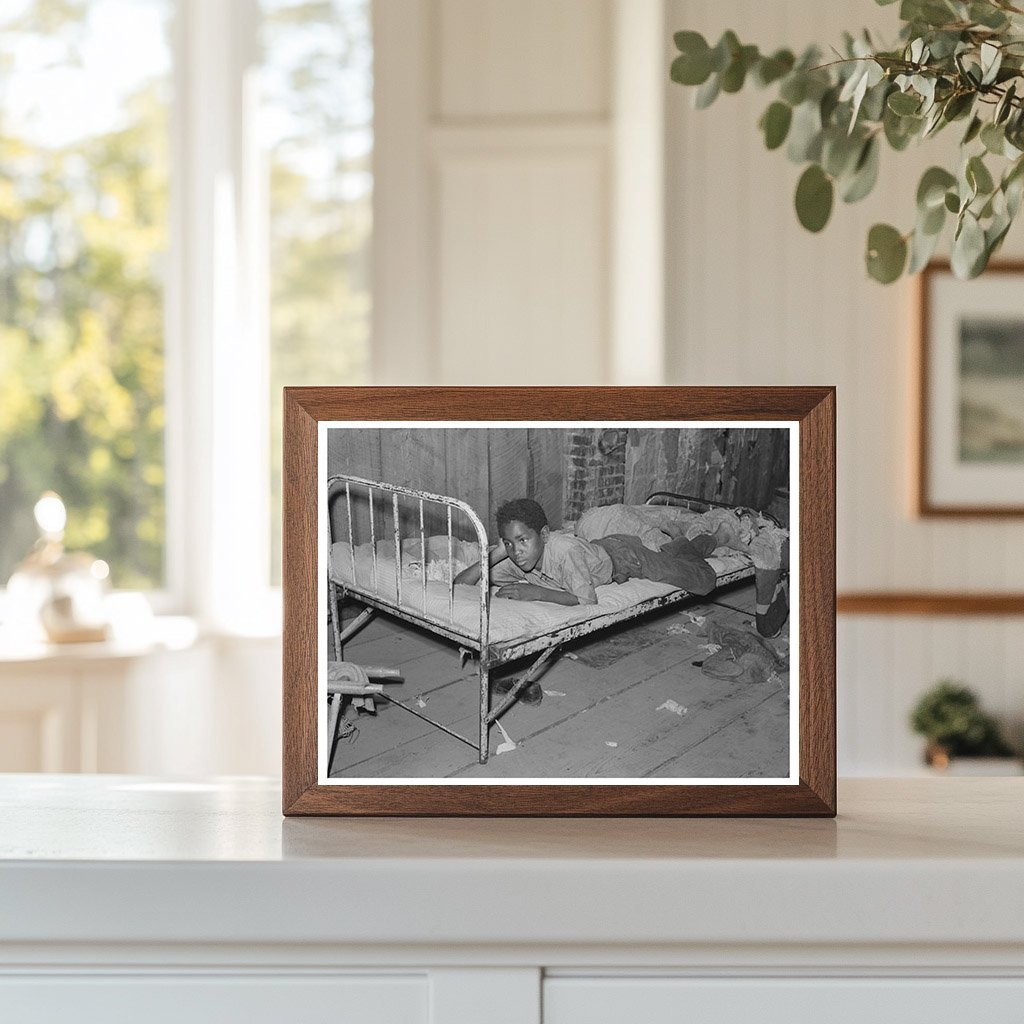 Boy Resting in Attic of Sharecropper Shack May 1938 - Available at KNOWOL