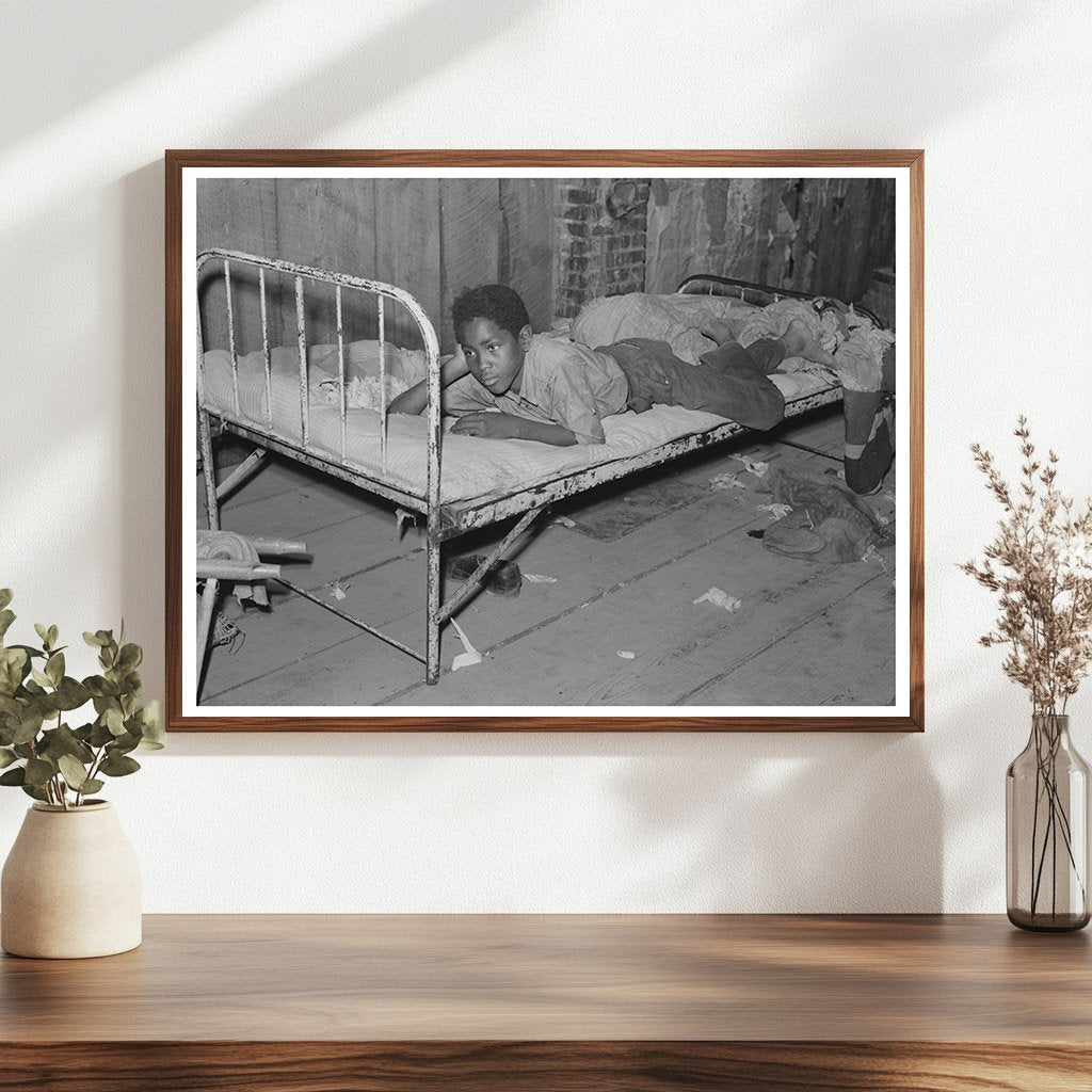 Boy Resting in Attic of Sharecropper Shack May 1938 - Available at KNOWOL