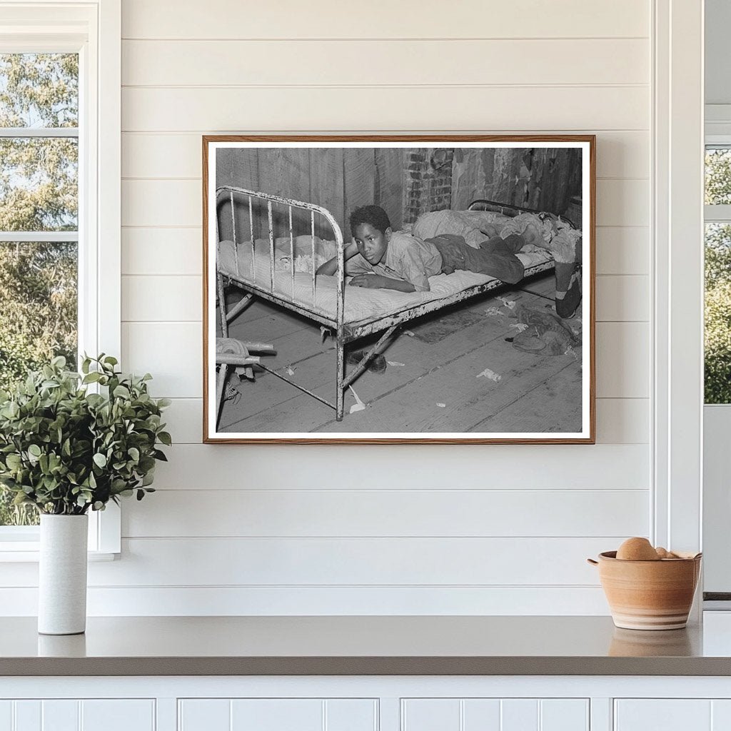 Boy Resting in Attic of Sharecropper Shack May 1938 - Available at KNOWOL