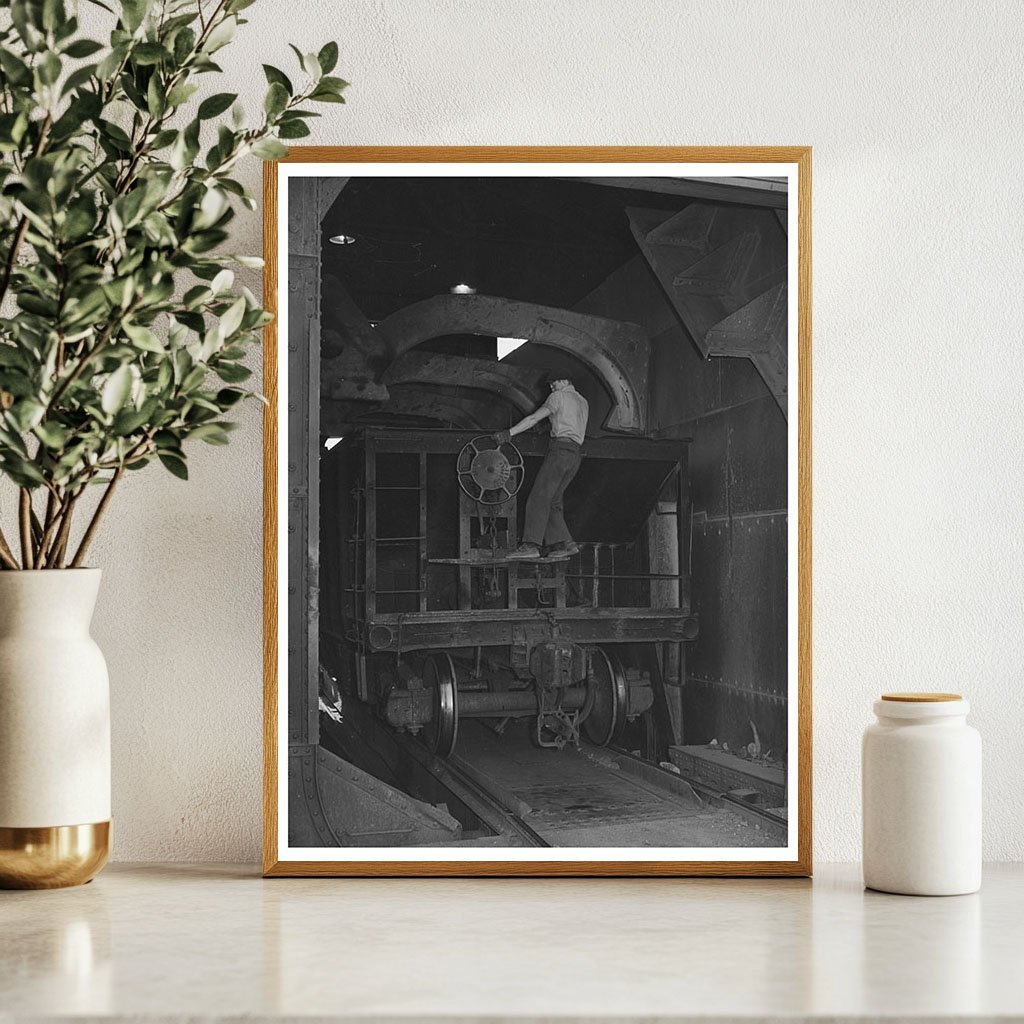 Brakeman Adjusts Ore Car Brakes Anaconda Montana 1942 - Available at KNOWOL