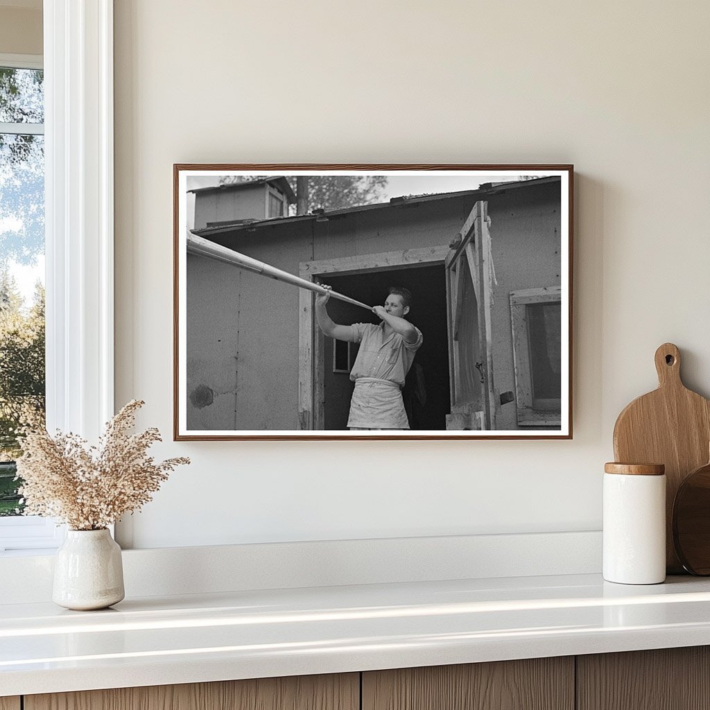 Camp Cook Blowing Dinner Horn at Lumber Camp 1937 - Available at KNOWOL