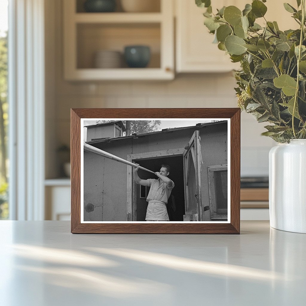 Camp Cook Blowing Dinner Horn at Lumber Camp 1937 - Available at KNOWOL