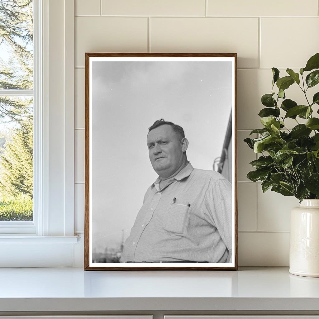 Captain of El Rito Navigating Mississippi River 1938 - Available at KNOWOL