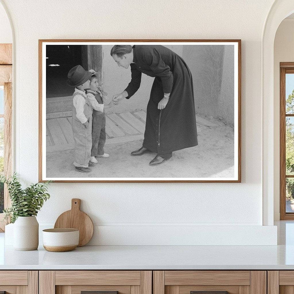 Catholic Priest Greets Boy After Mass Trampas New Mexico 1940 - Available at KNOWOL