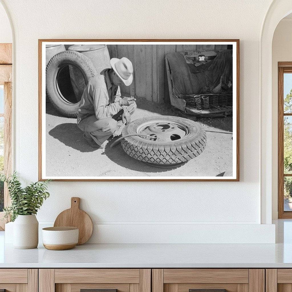 Changing a Tire at a Garage in Pie Town New Mexico 1940 - Available at KNOWOL