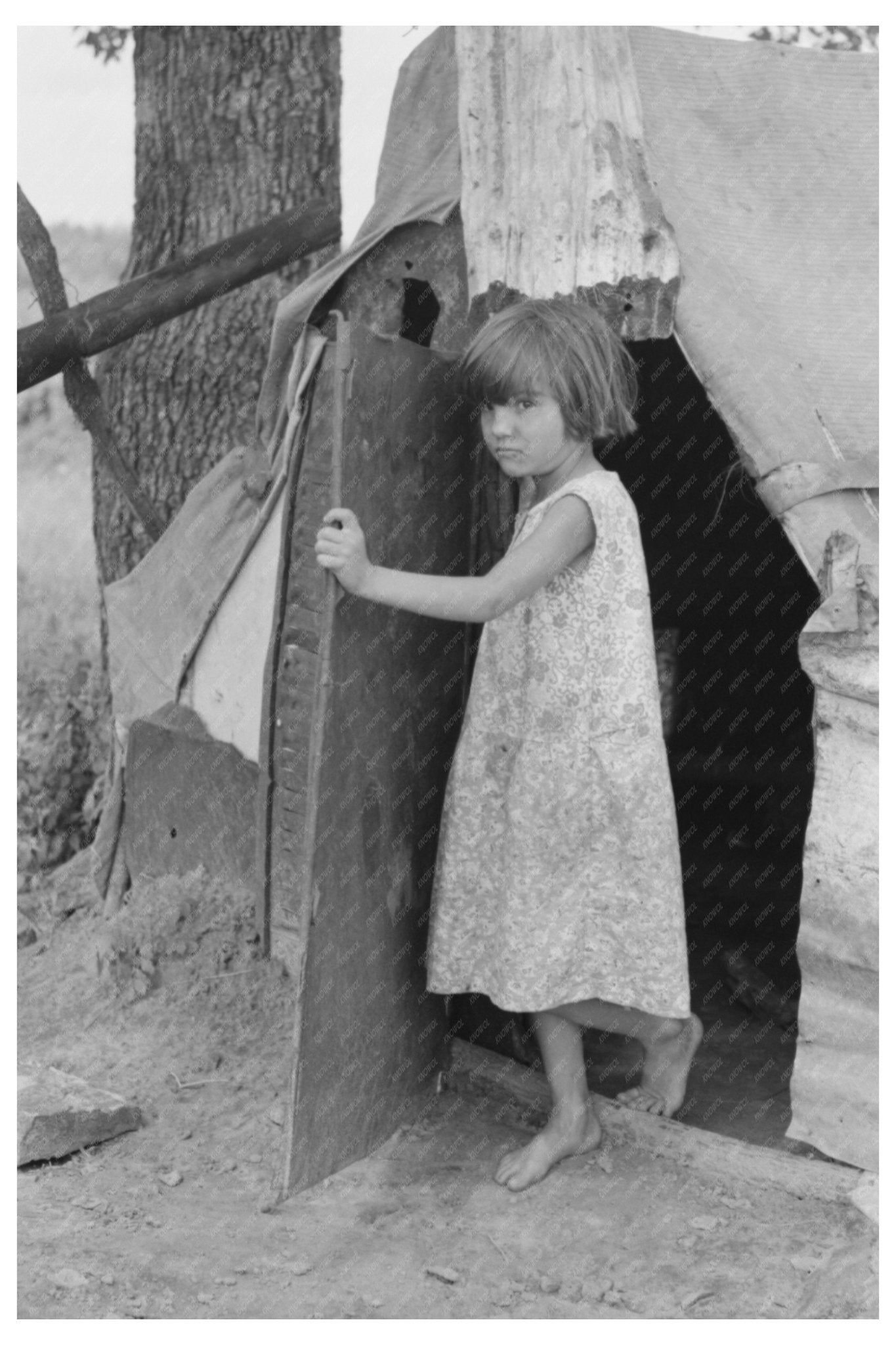 Child at Tent Entrance Sequoyah County Oklahoma June 1939 - Available at KNOWOL