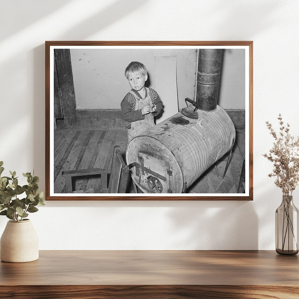 Child by Oil Drum Stove in Jefferson Texas April 1939 - Available at KNOWOL
