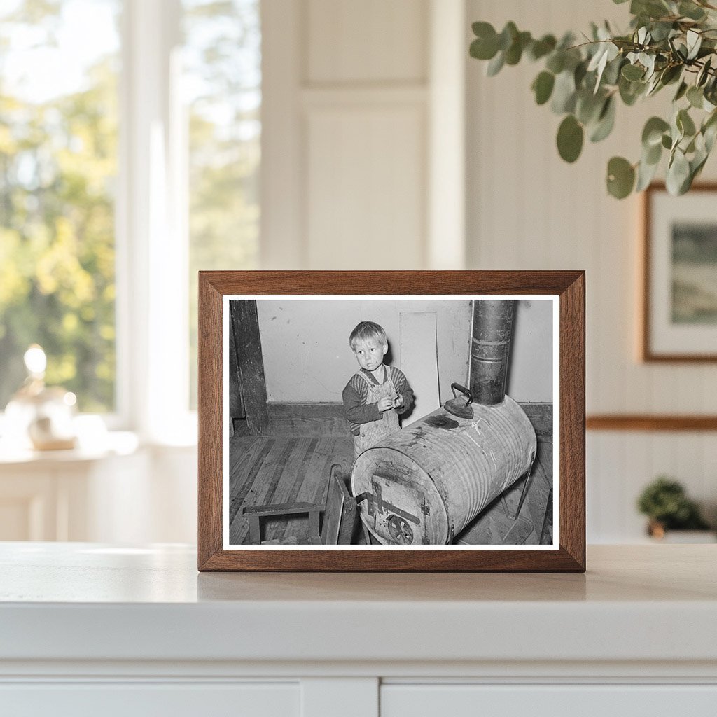 Child by Oil Drum Stove in Jefferson Texas April 1939 - Available at KNOWOL