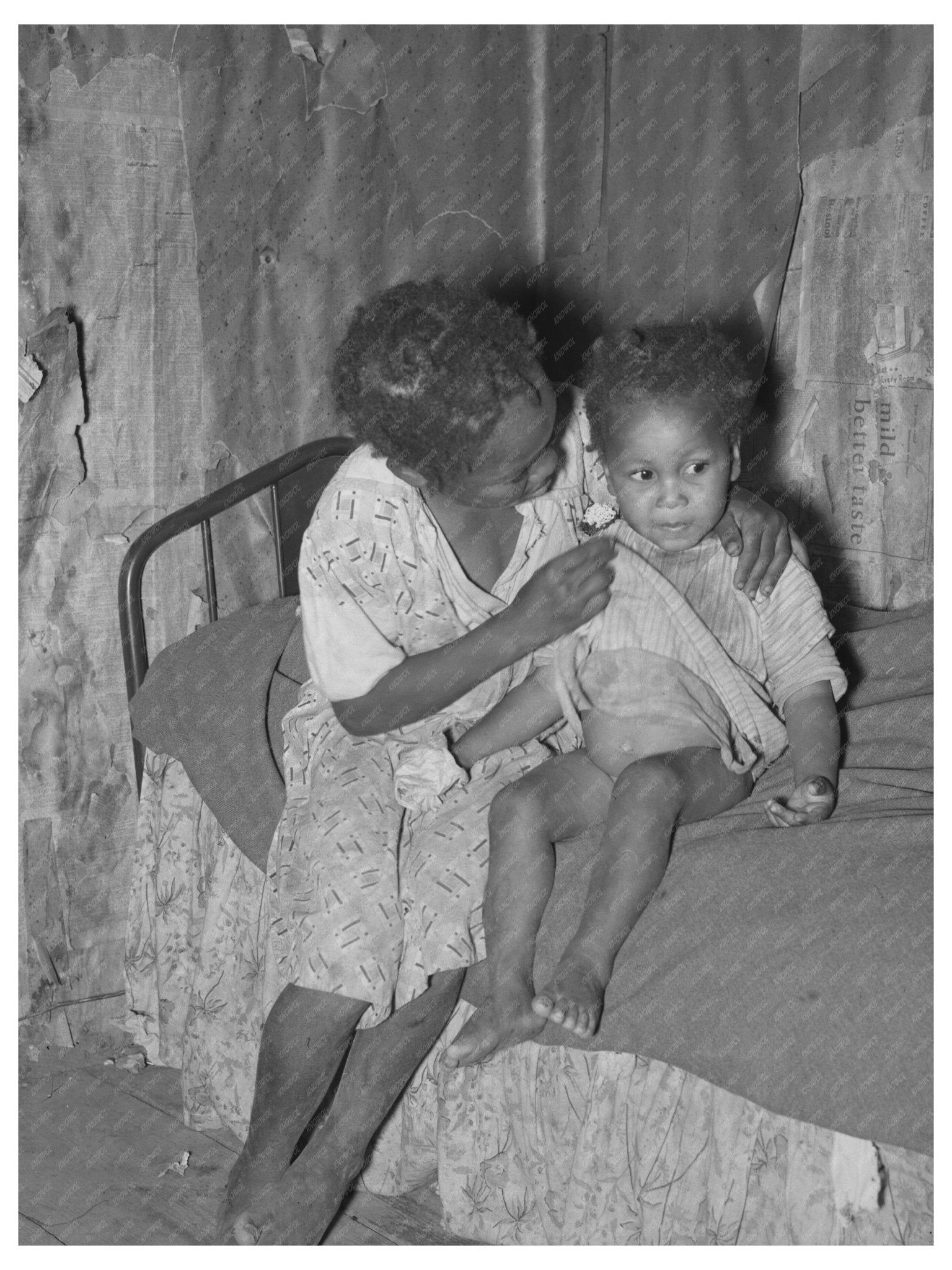 Child Caring for Baby in Sharecropper Cabin Missouri 1938 - Available at KNOWOL