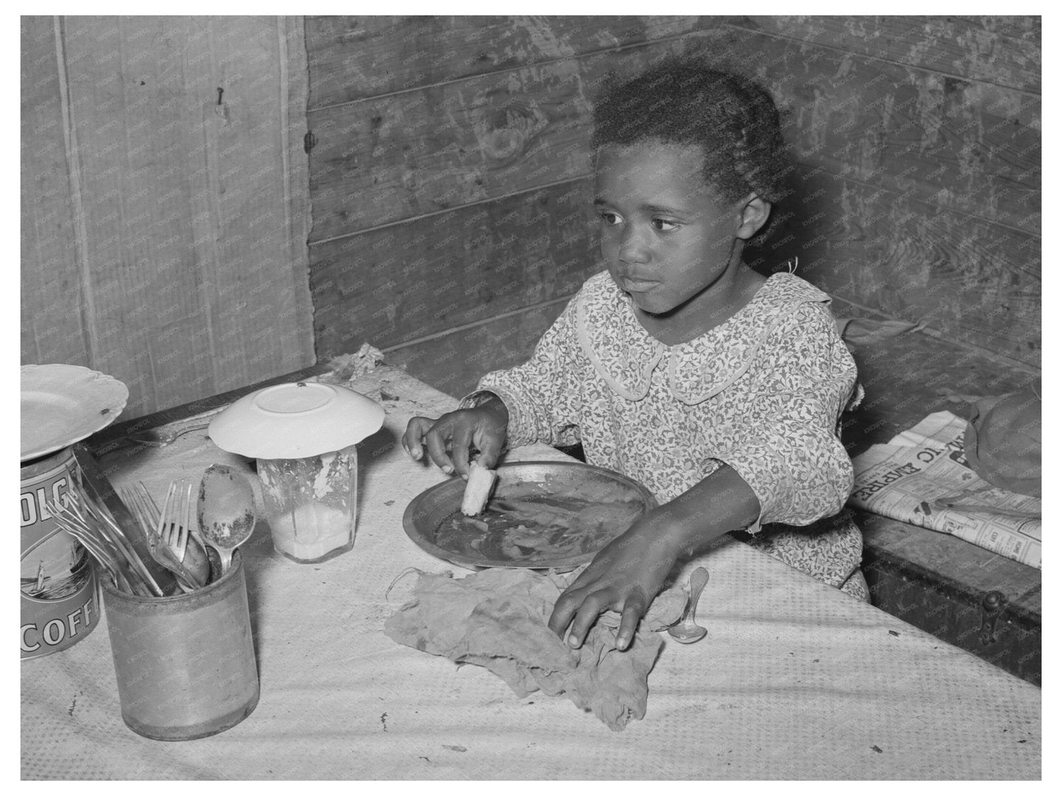 Child Eating Bread and Gravy in Wagoner County 1939 - Available at KNOWOL