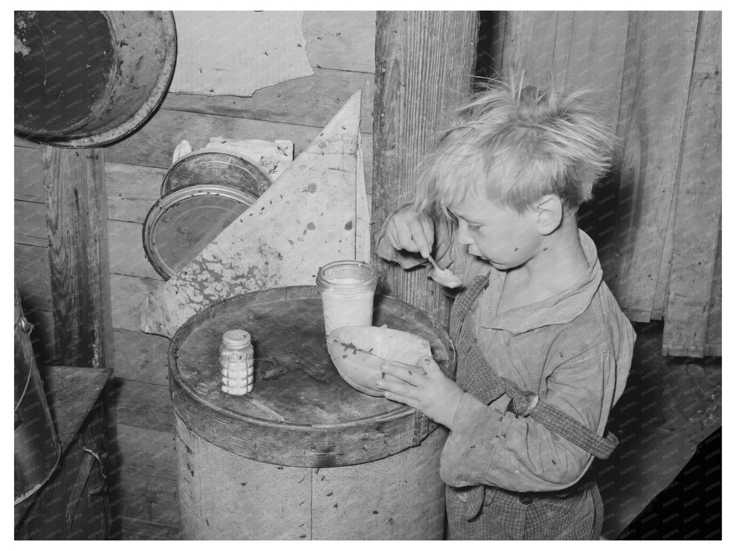Child Eating Cantaloupe in Oklahoma City Camp July 1939 - Available at KNOWOL