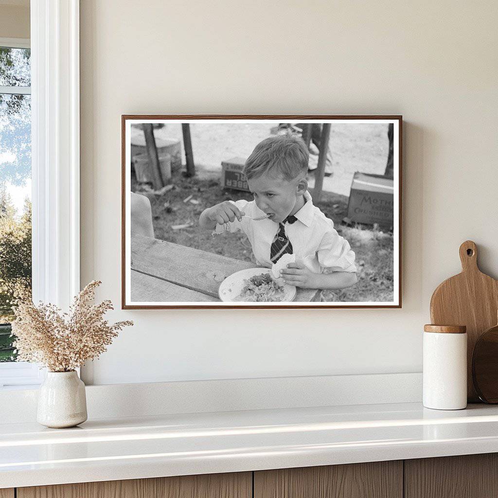 Child Eating Dinner at Community Sing Pie Town New Mexico 1940 - Available at KNOWOL