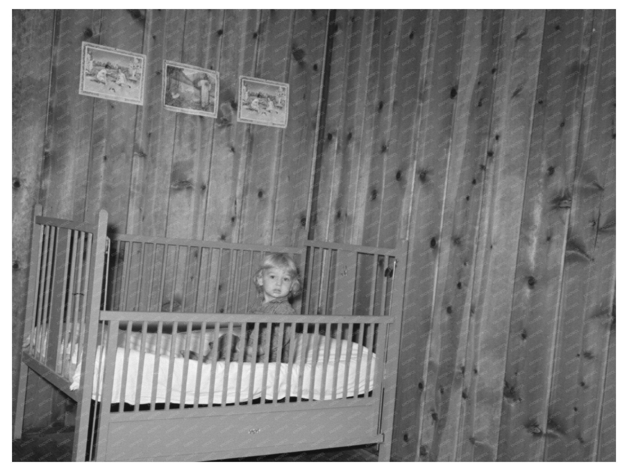 Child in Bed at Farm Home Arkansas 1938 - Available at KNOWOL