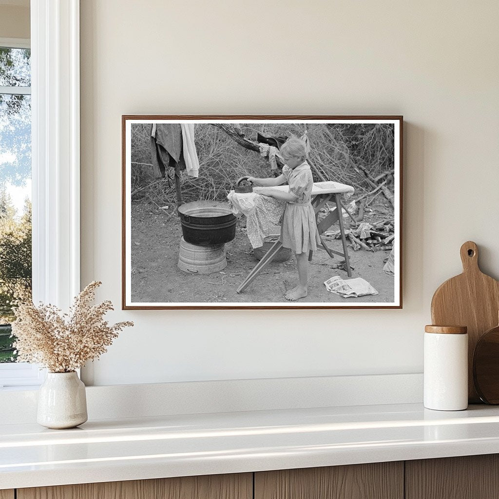 Child Ironing in Migrant Camp Harlingen Texas 1939 - Available at KNOWOL