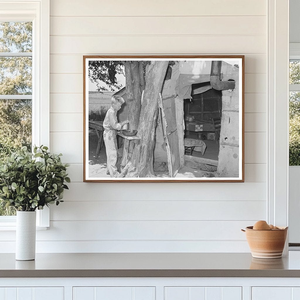 Child Laborer Washing Up in Tent Home 1939 - Available at KNOWOL