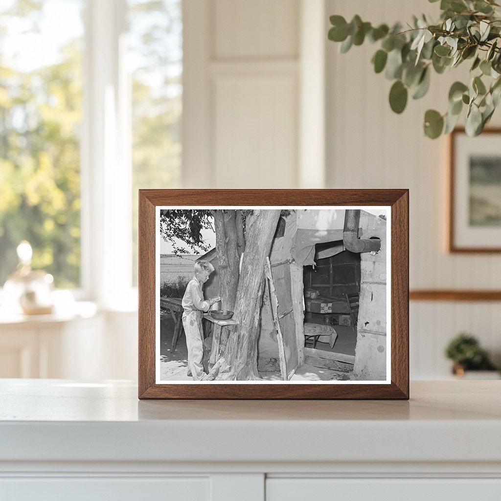 Child Laborer Washing Up in Tent Home 1939 - Available at KNOWOL