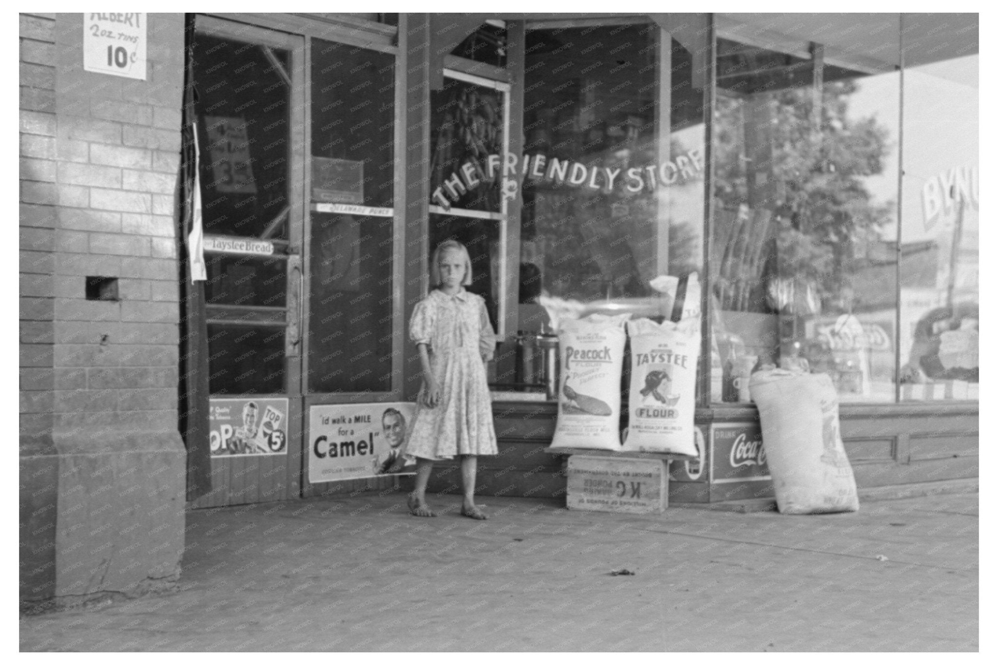Child Leaves Grocery Store in Webbers Falls Oklahoma 1939 - Available at KNOWOL