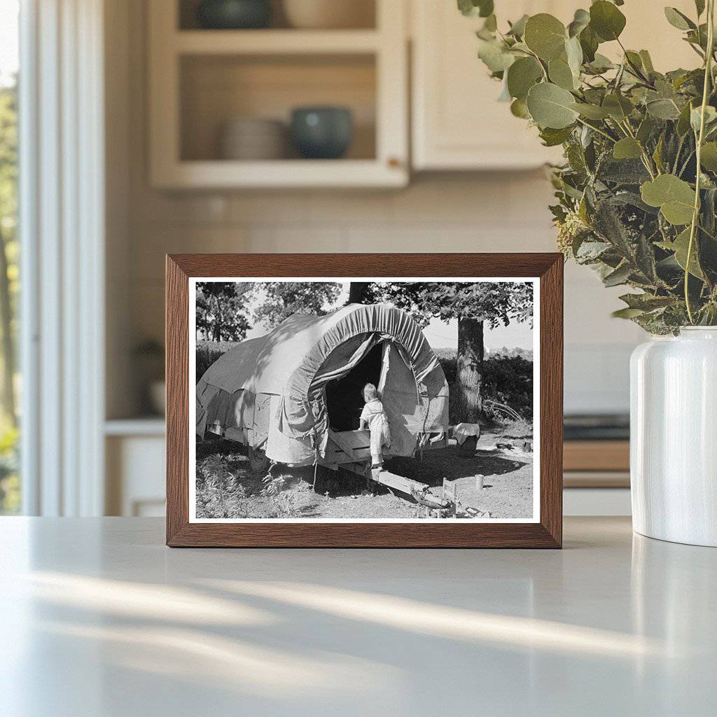 Child of Migrant Entering Covered Wagon Oklahoma 1939 - Available at KNOWOL