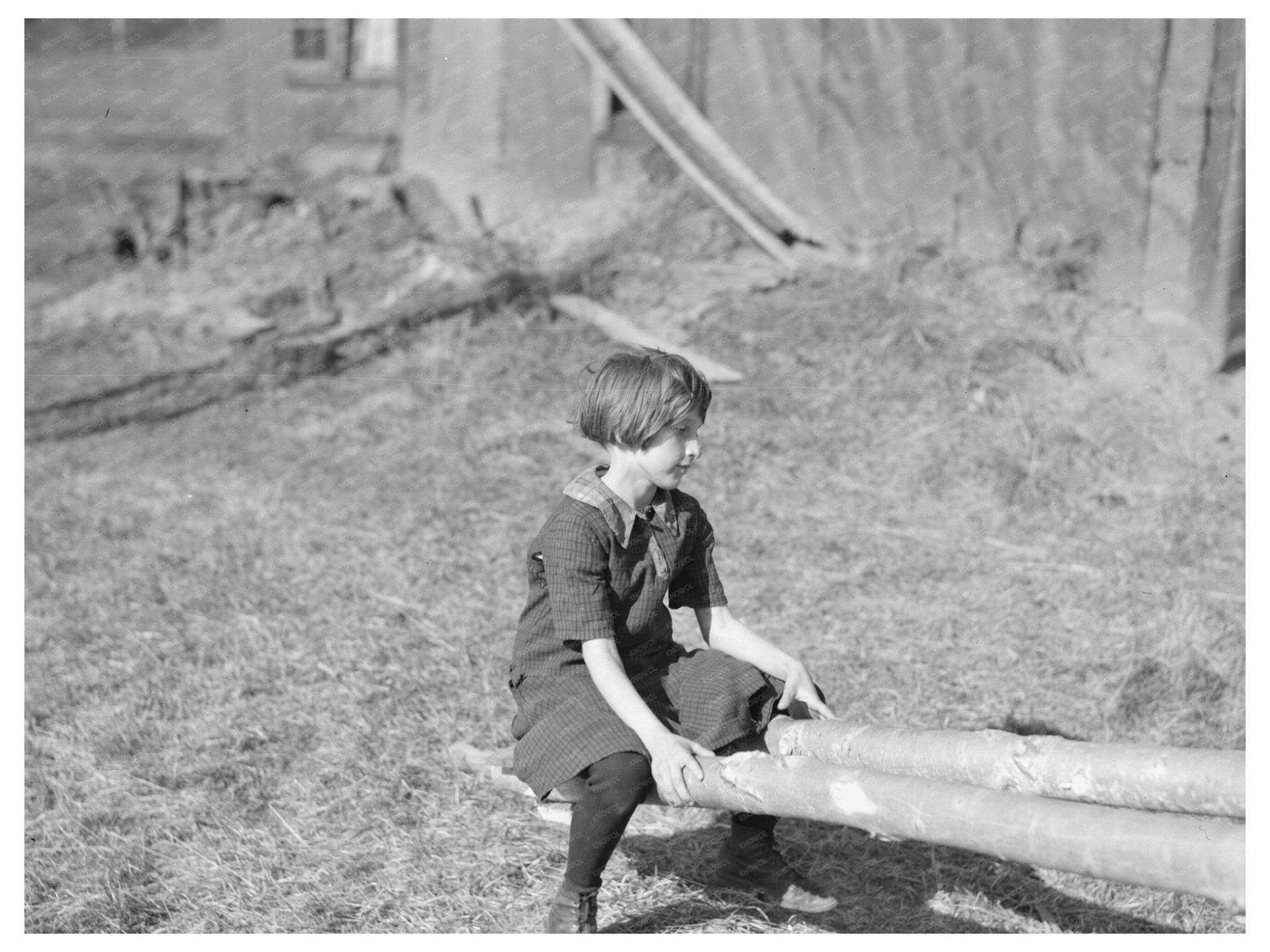 Child Playing on Teeter - Totter Long Lake Wisconsin 1937 - Available at KNOWOL