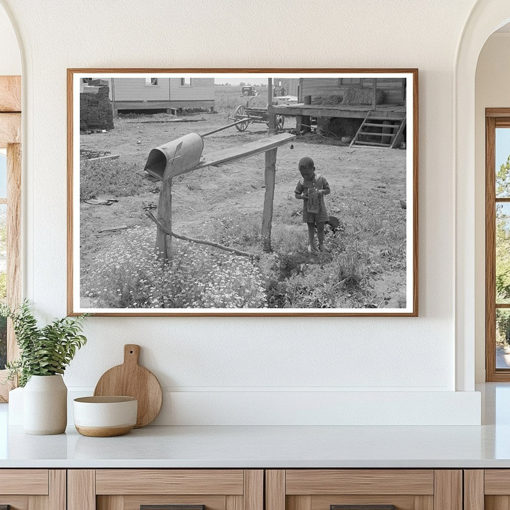 Child Playing with Toy by Mailbox in Southeast Missouri 1938 - Available at KNOWOL
