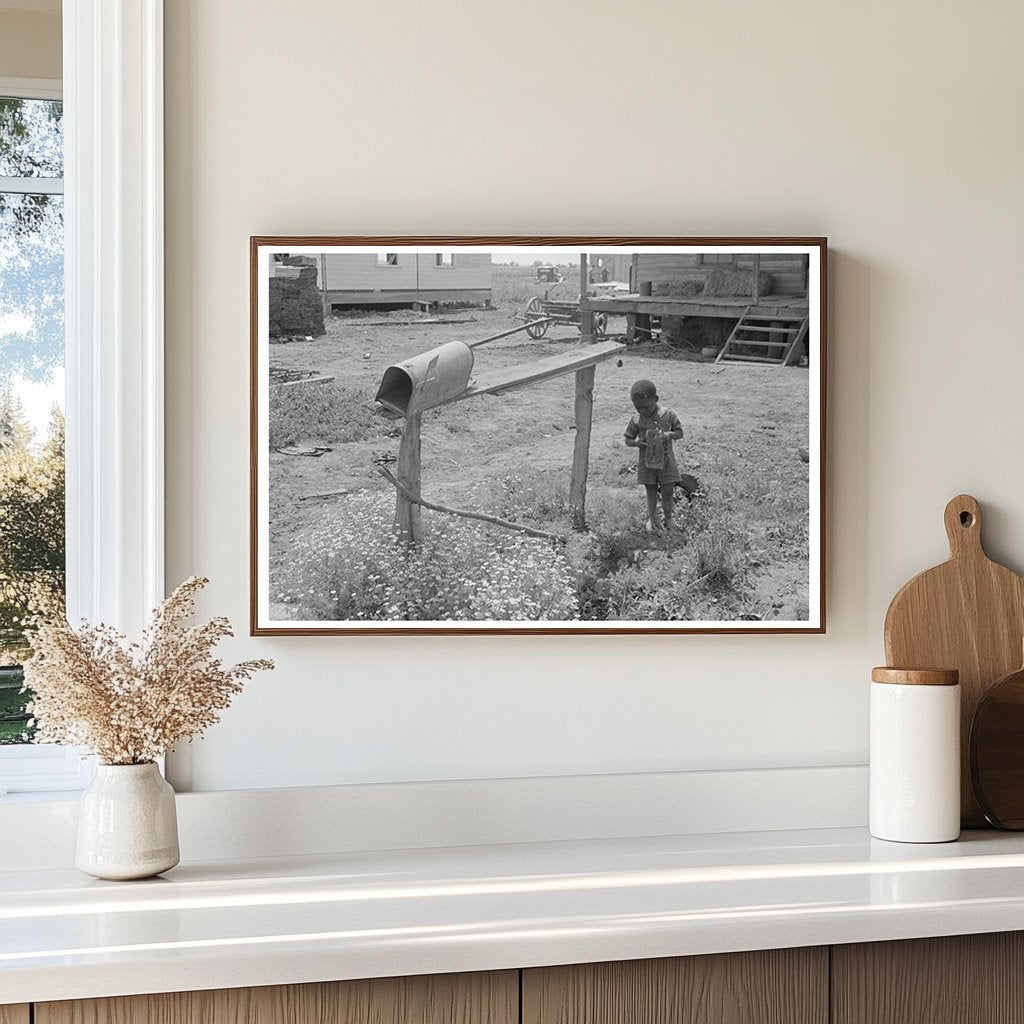 Child Playing with Toy by Mailbox in Southeast Missouri 1938 - Available at KNOWOL