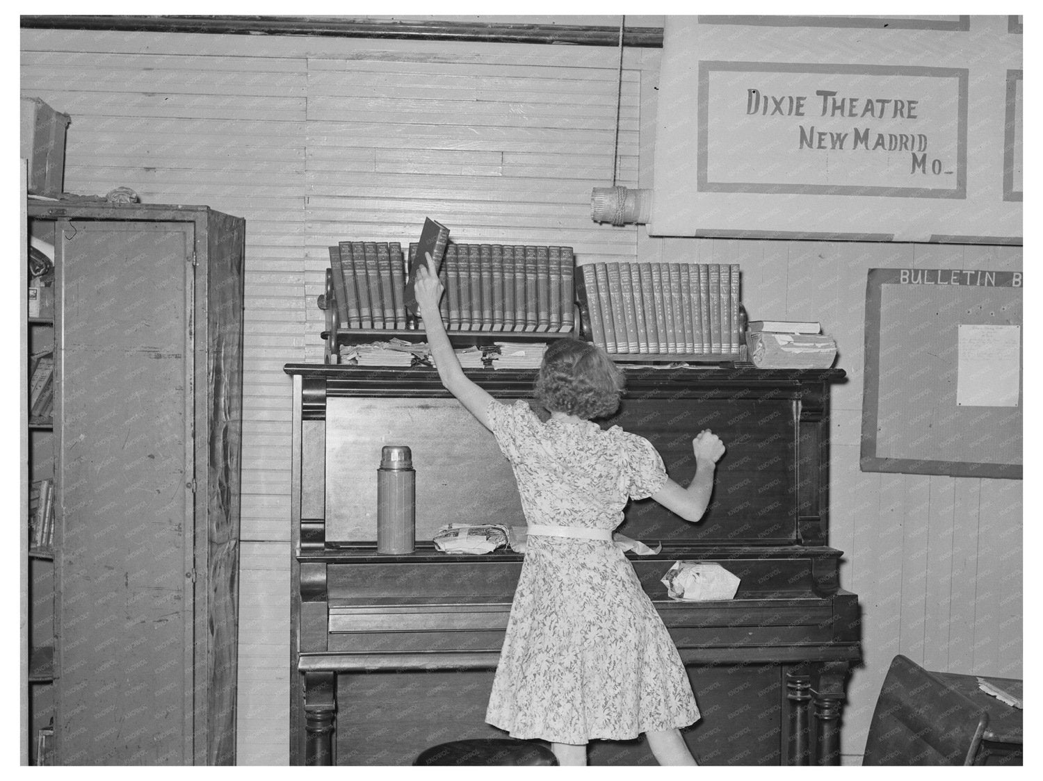 Child Removing Book in Southeast Missouri Schoolroom 1938 - Available at KNOWOL