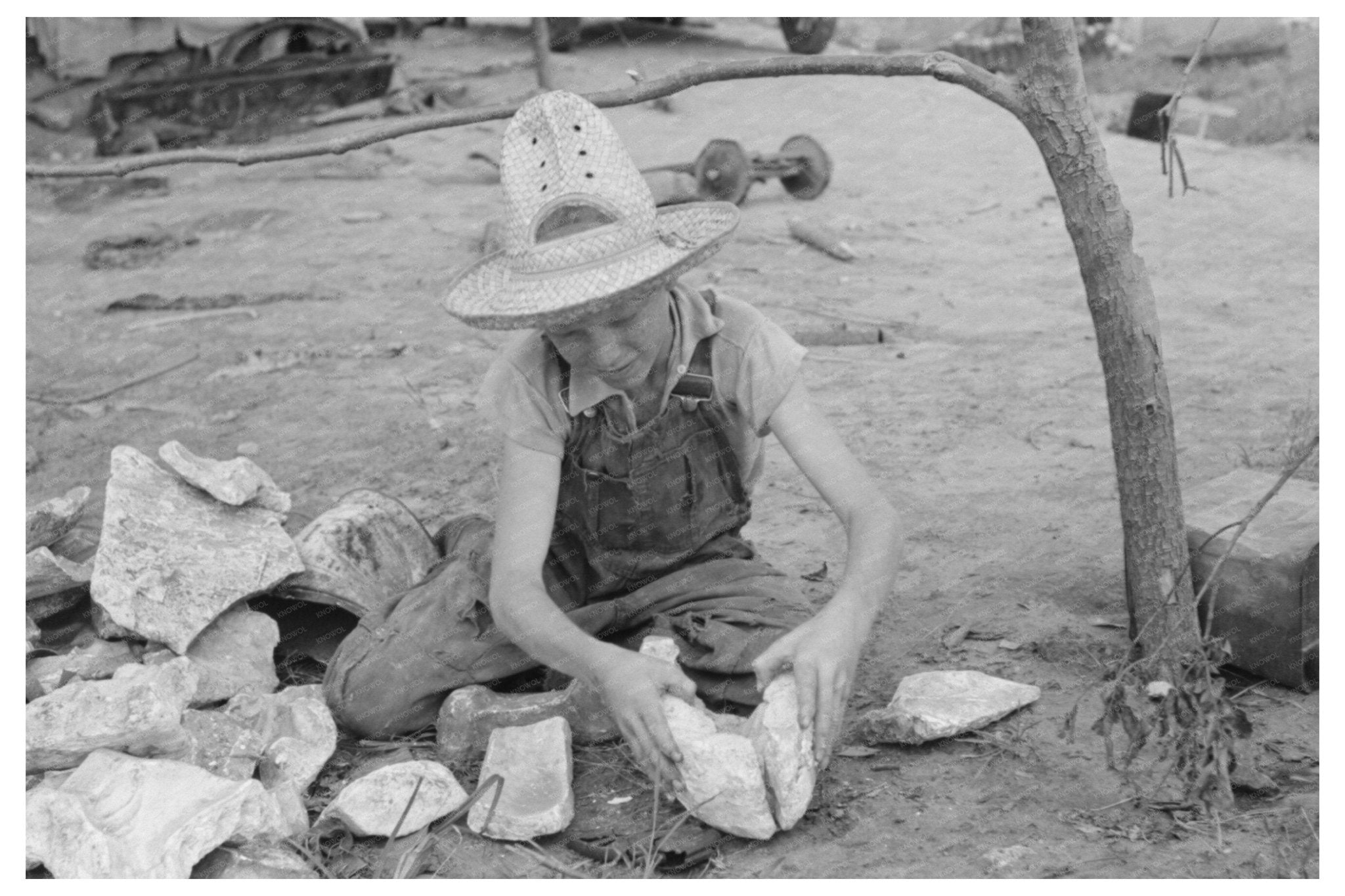 Child with Itinerant Statue Maker in Sequoyah County 1939 - Available at KNOWOL