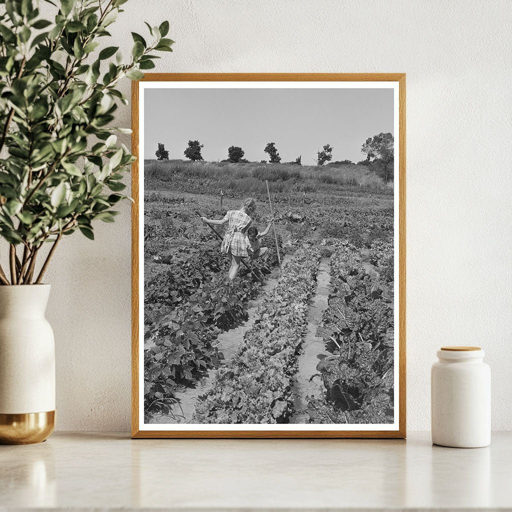 Children Gardening at Farm Security Administration Community 1942 - Available at KNOWOL