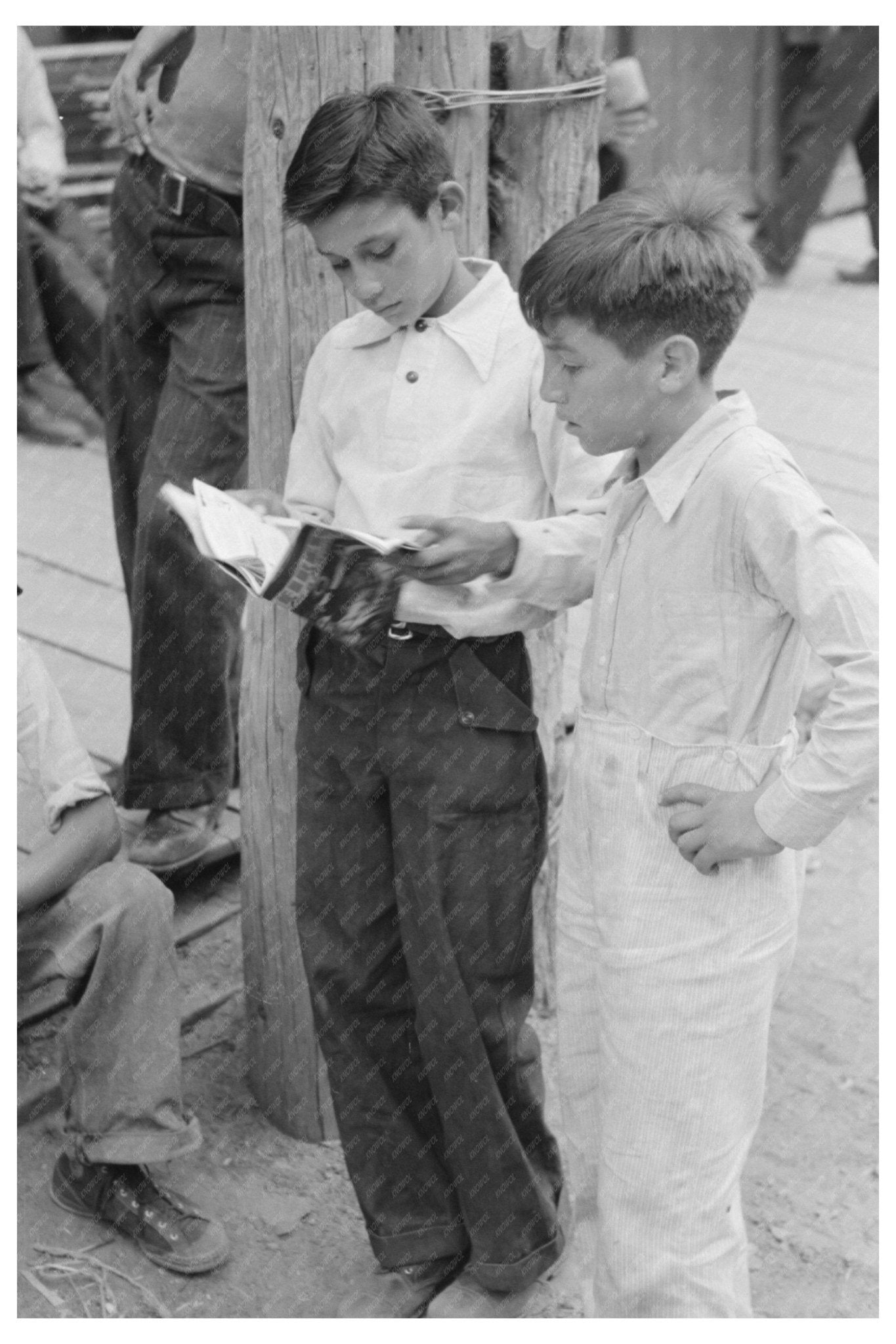 Children in Mogollon New Mexico Reading Comics June 1940 - Available at KNOWOL