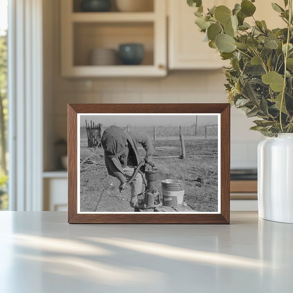 Children of African American Sharecroppers at Water Pump 1939 - Available at KNOWOL