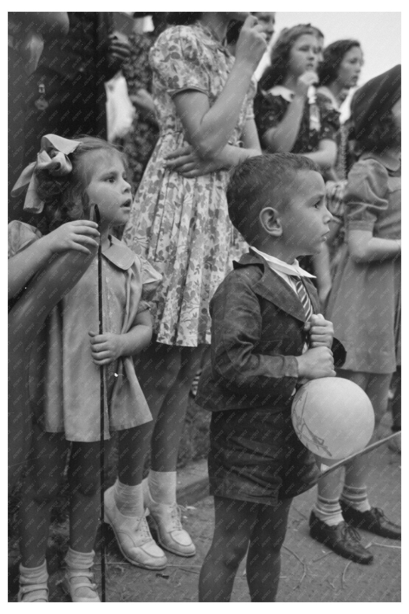 Children Watching Parade at National Rice Festival 1938 - Available at KNOWOL