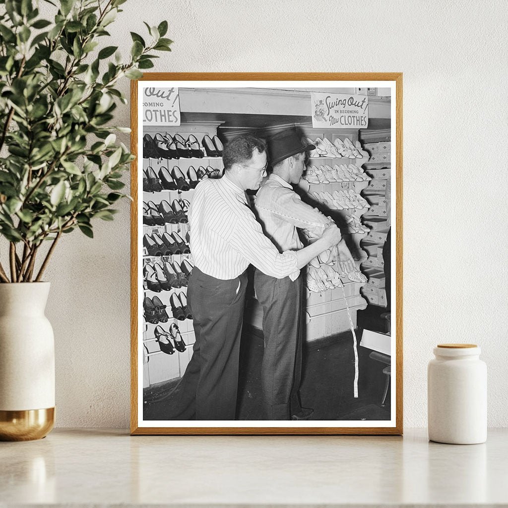 Clerk Measuring Customer for Suit San Augustine Texas 1939 - Available at KNOWOL