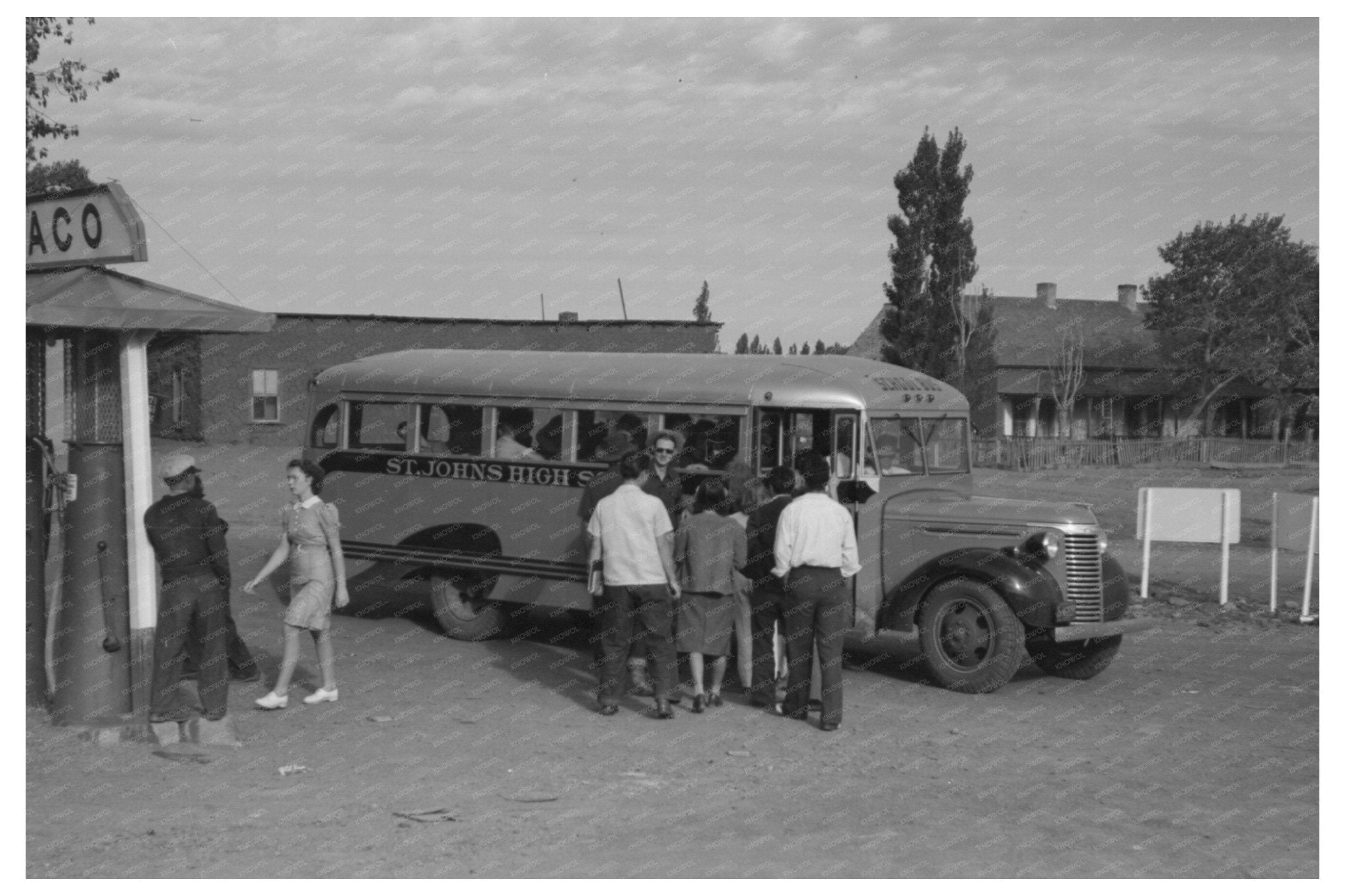Concho Arizona Schoolchildren Board Bus for High School 1940 - Available at KNOWOL