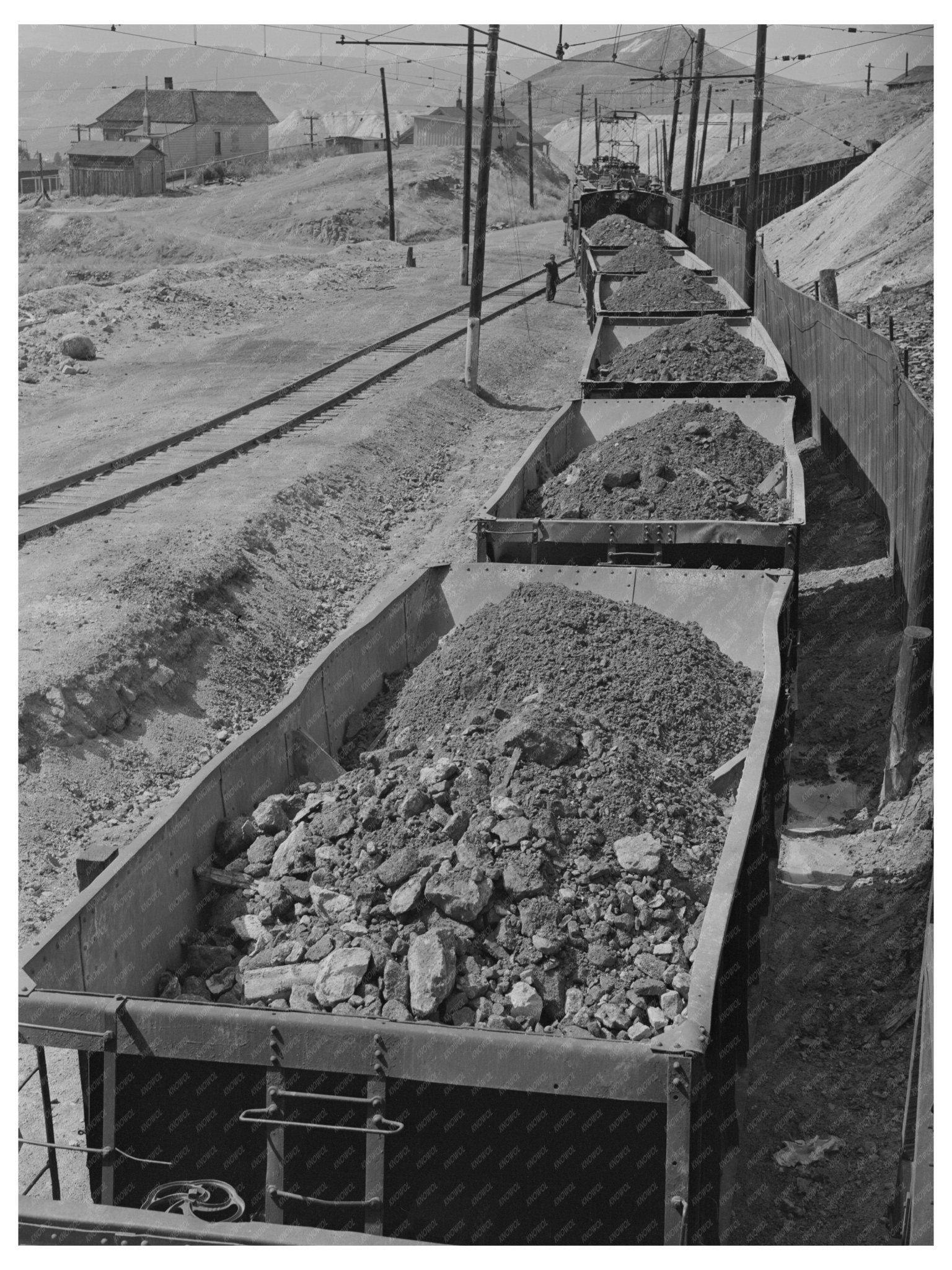 Copper Ore Cars Departing Anaconda Mining Montana 1942 - Available at KNOWOL