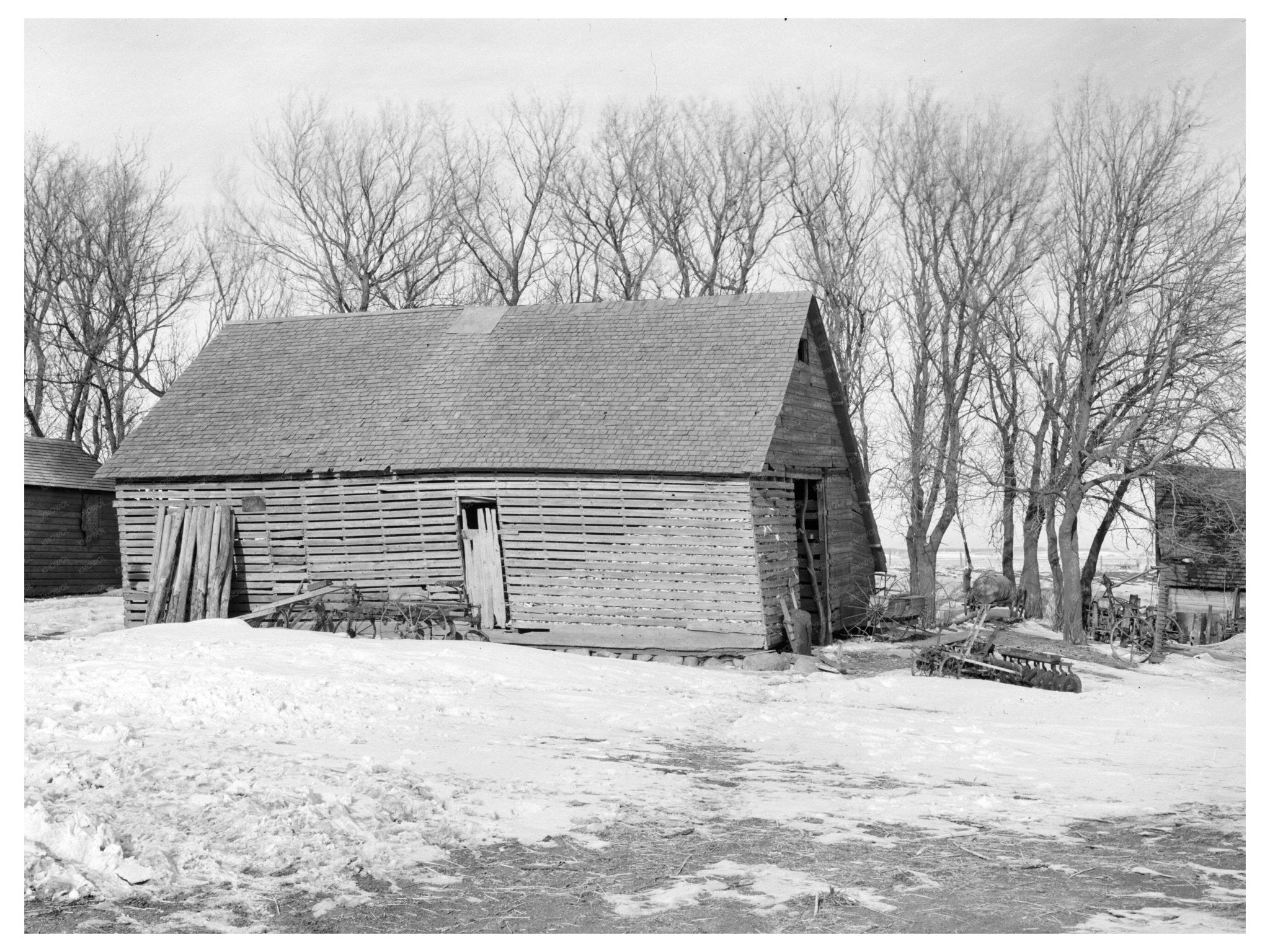 Corn Crib on Edgar Allens Farm Milford Iowa 1936 - Available at KNOWOL