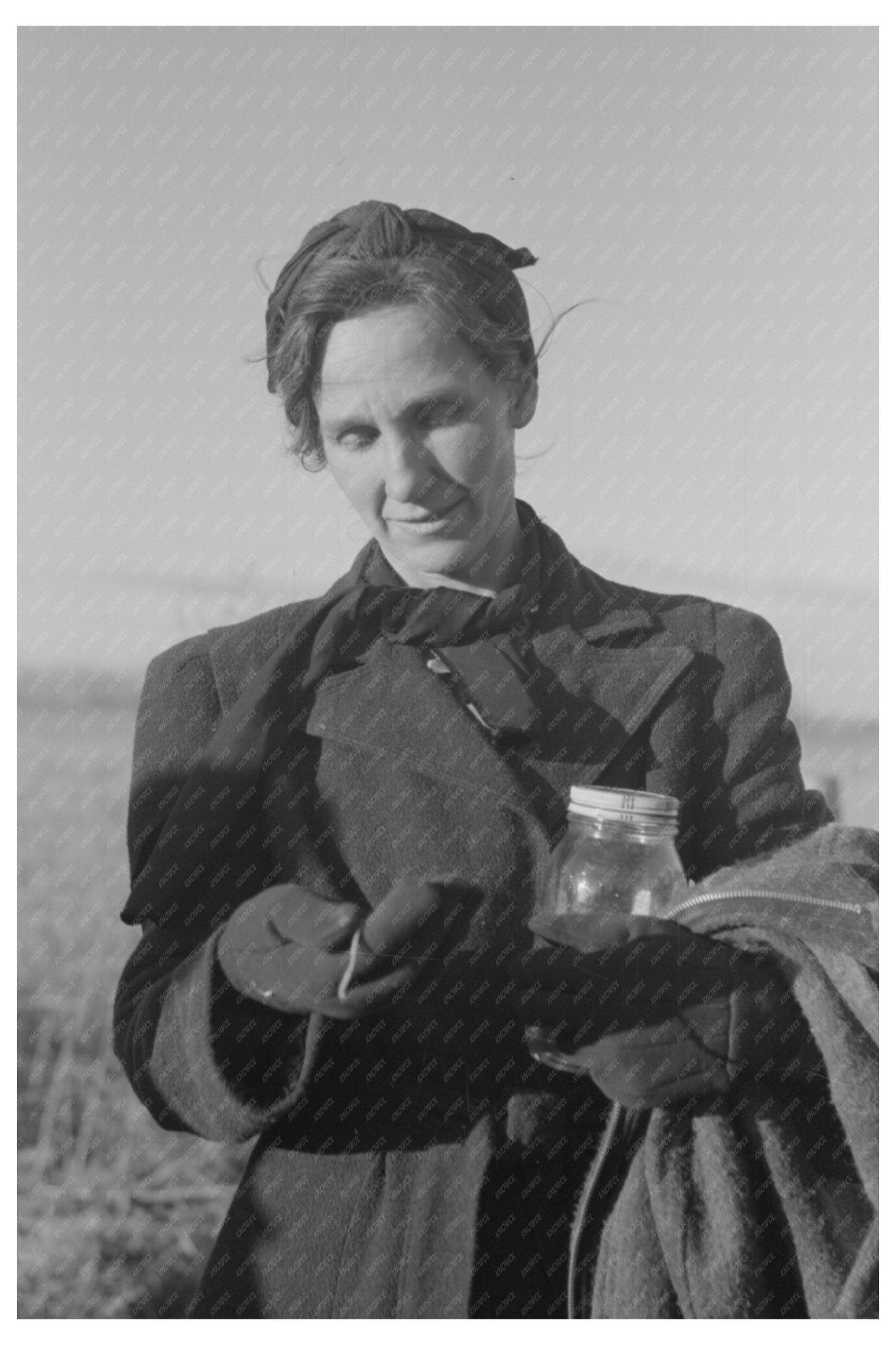 Cornhusking Contest Wife Timing Husband Ontario 1941 - Available at KNOWOL