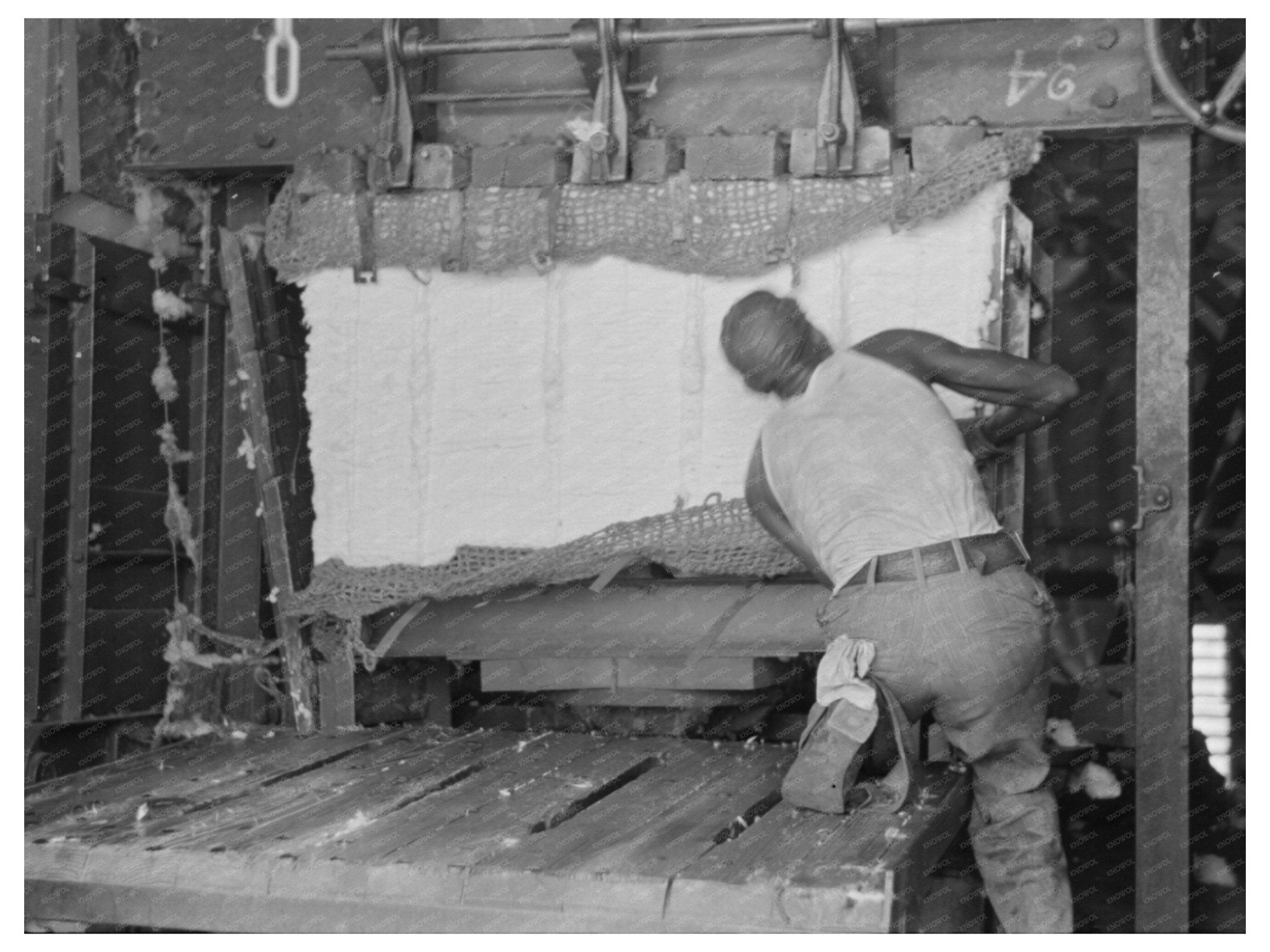 Cotton Gin Workers Securing Bales in Lehi Arkansas 1938 - Available at KNOWOL