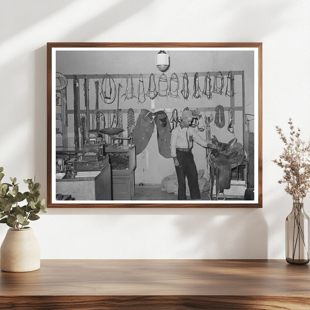 Cowboy Examining Saddle in Brewster County Texas 1939 - Available at KNOWOL