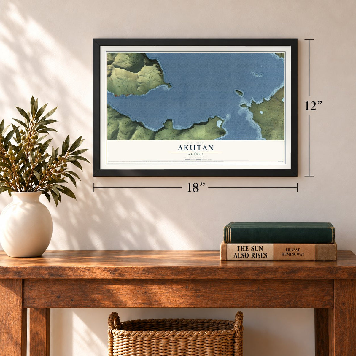 Akutan, Alaska map, 12 x 18 inch print in a black frame in an entryway