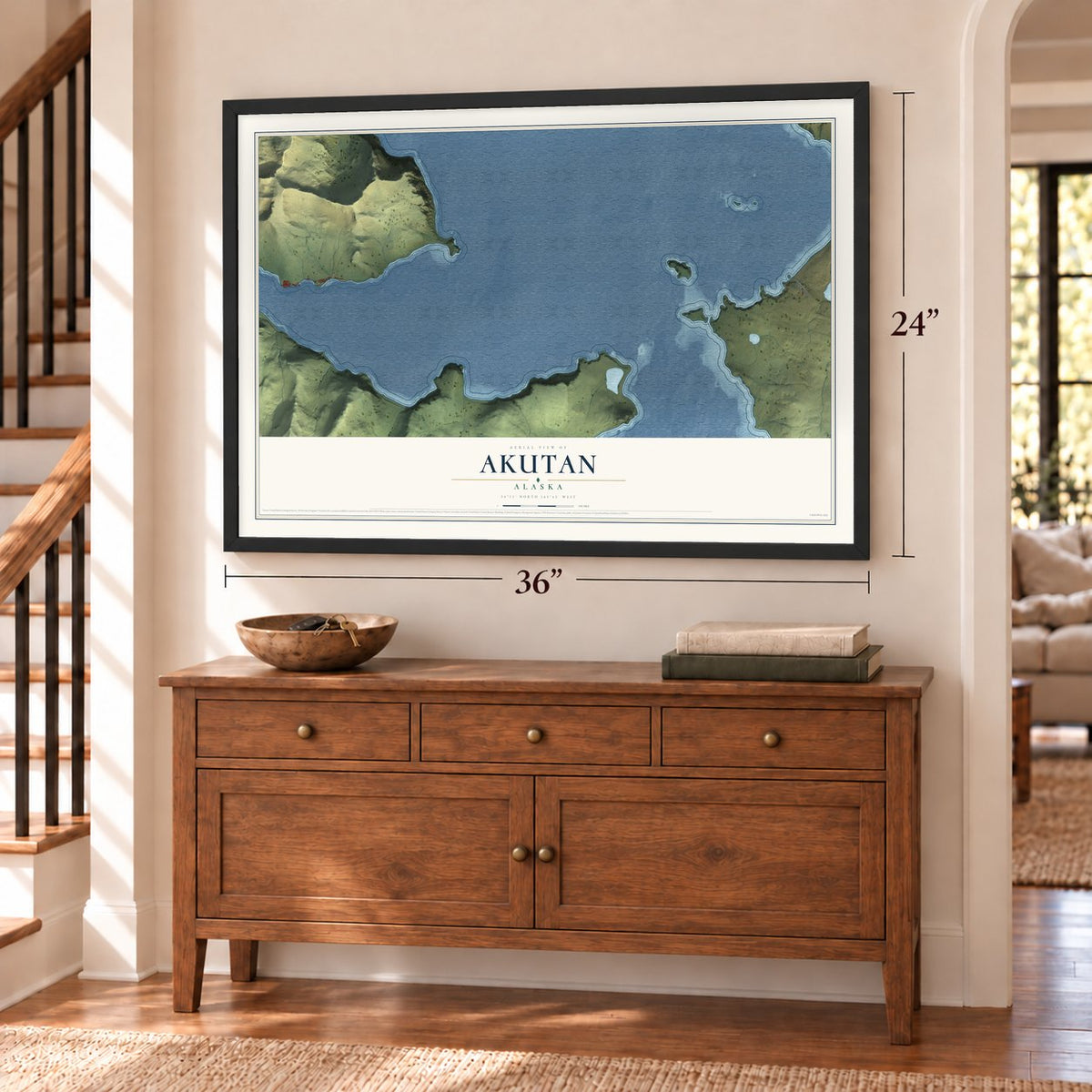 Akutan, Alaska map, 24 x 36 inch print in a black frame above a dresser by a staircase