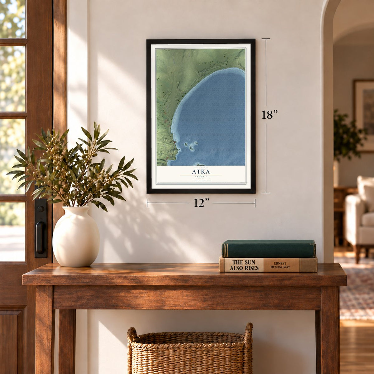 Atka, Alaska map, 12 x 18 inch print in a black frame in an entryway