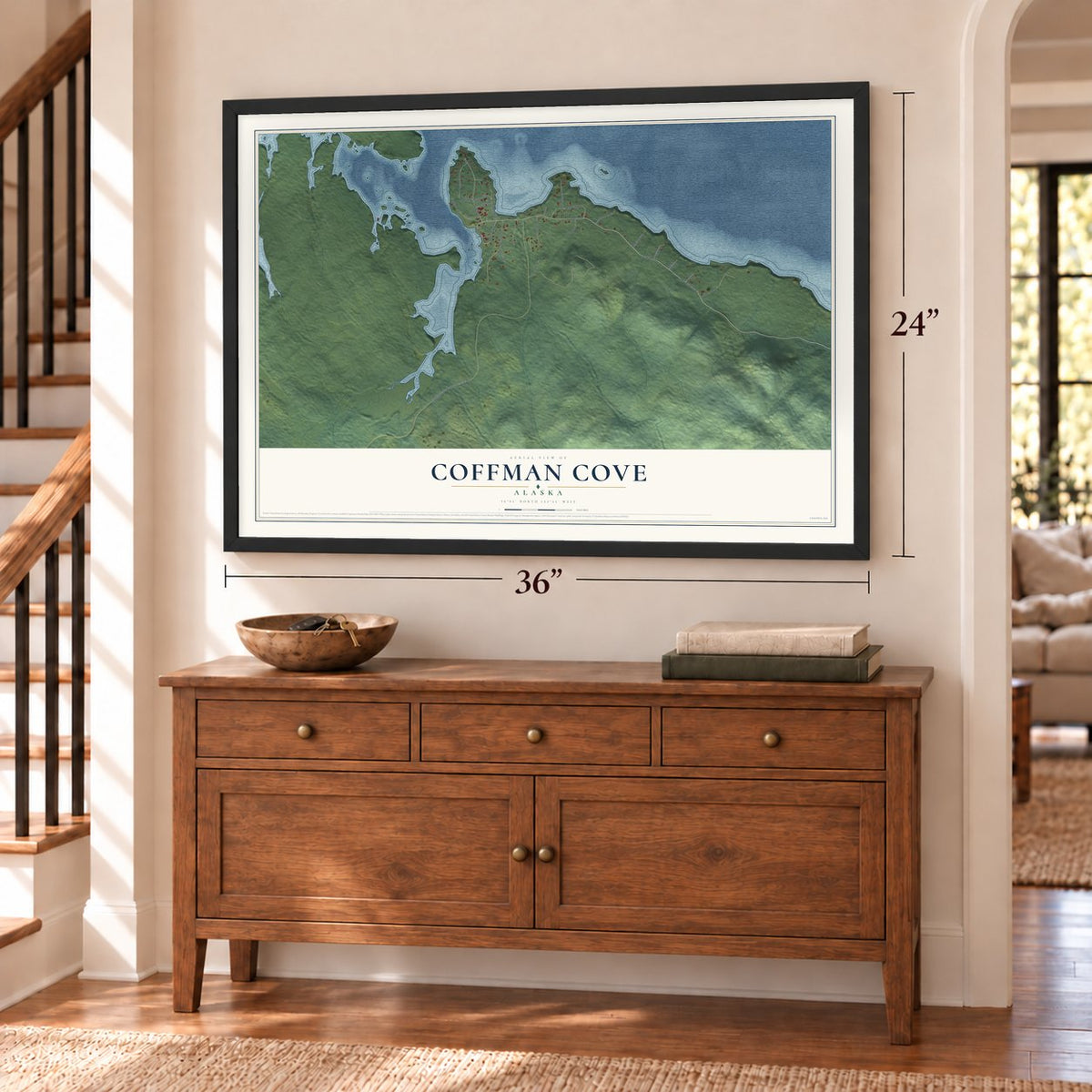Coffman Cove, Alaska map, 24 x 36 inch print in a black frame above a dresser by a staircase