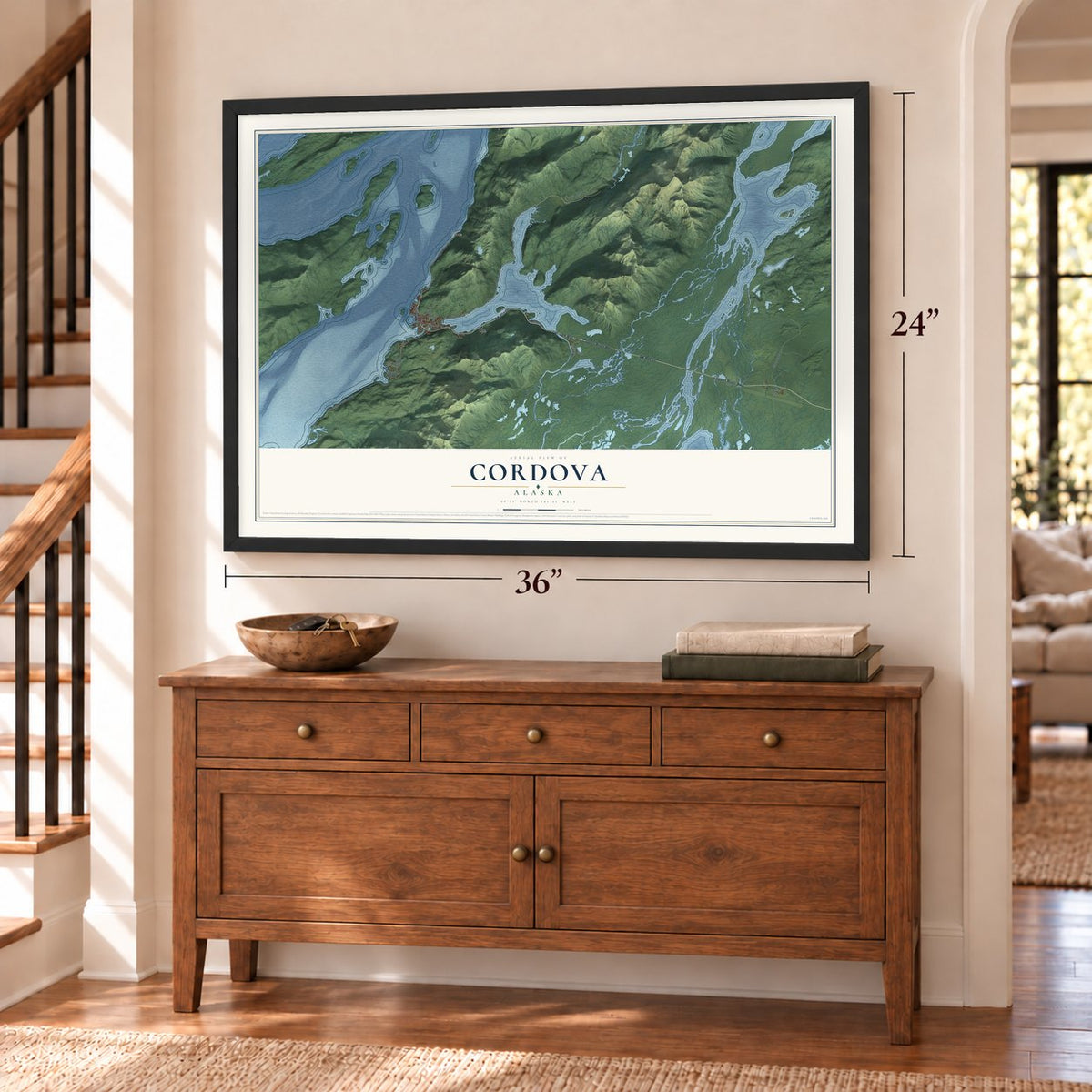 Cordova, Alaska map, 24 x 36 inch print in a black frame above a dresser by a staircase