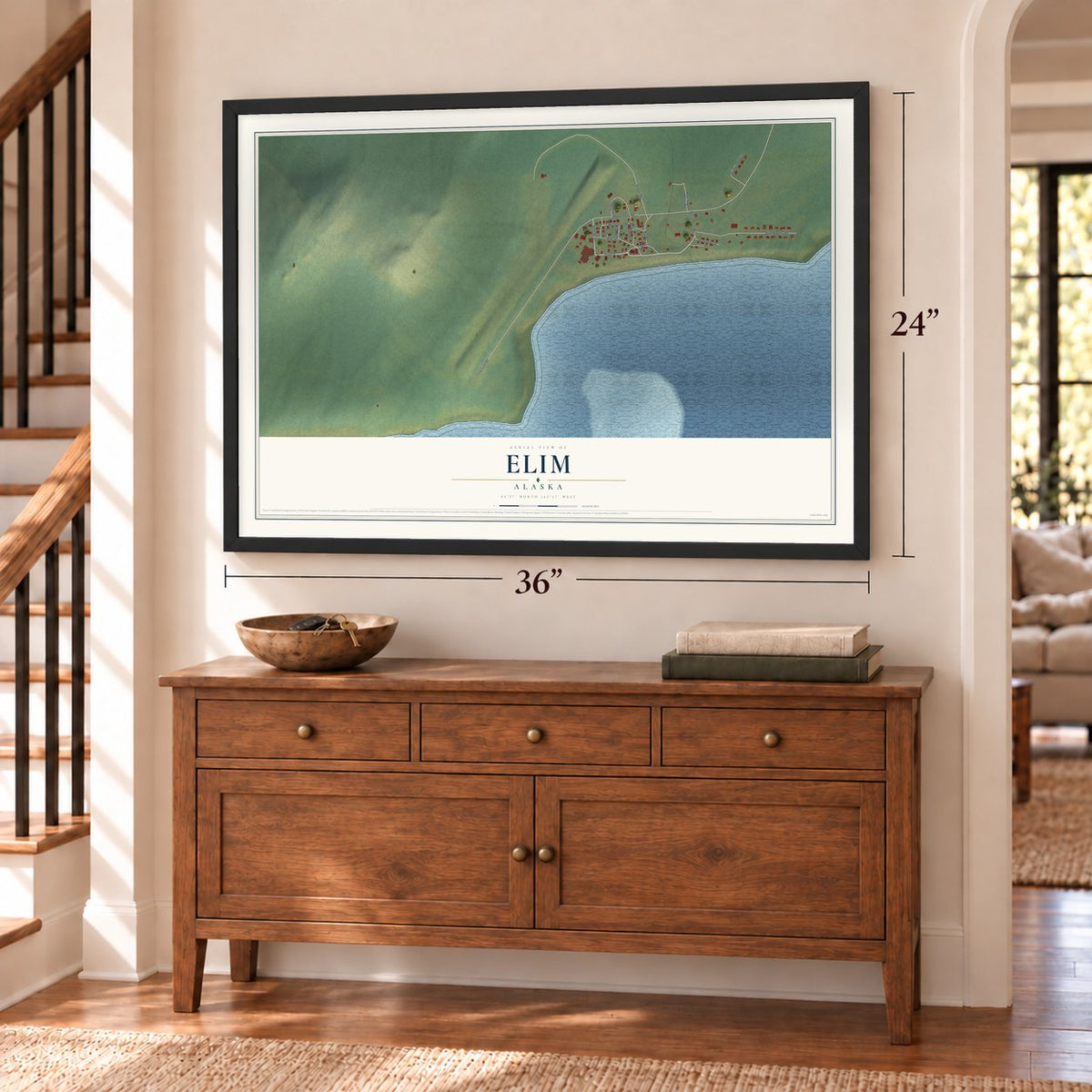 Elim, Alaska map, 24 x 36 inch print in a black frame above a dresser by a staircase