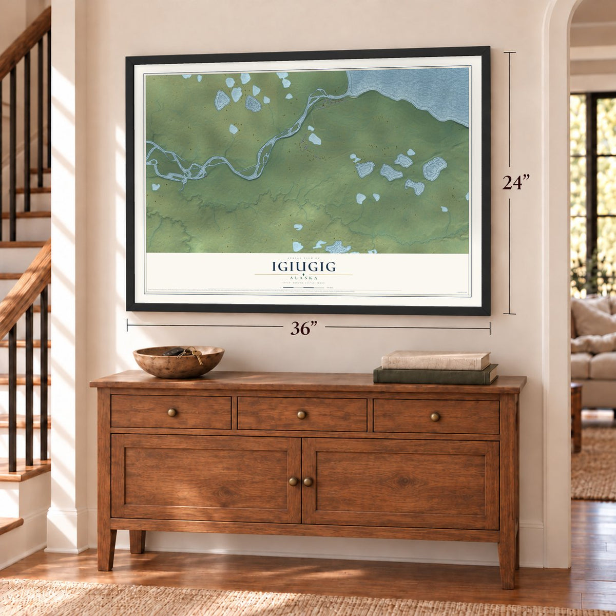Igiugig, Alaska map, 24 x 36 inch print in a black frame above a dresser by a staircase