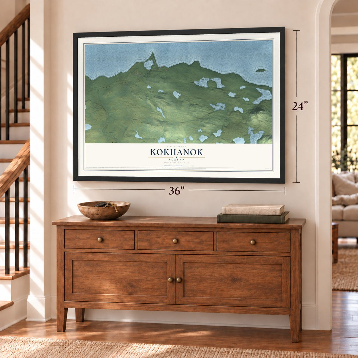 Kokhanok, Alaska map, 24 x 36 inch print in a black frame above a dresser by a staircase