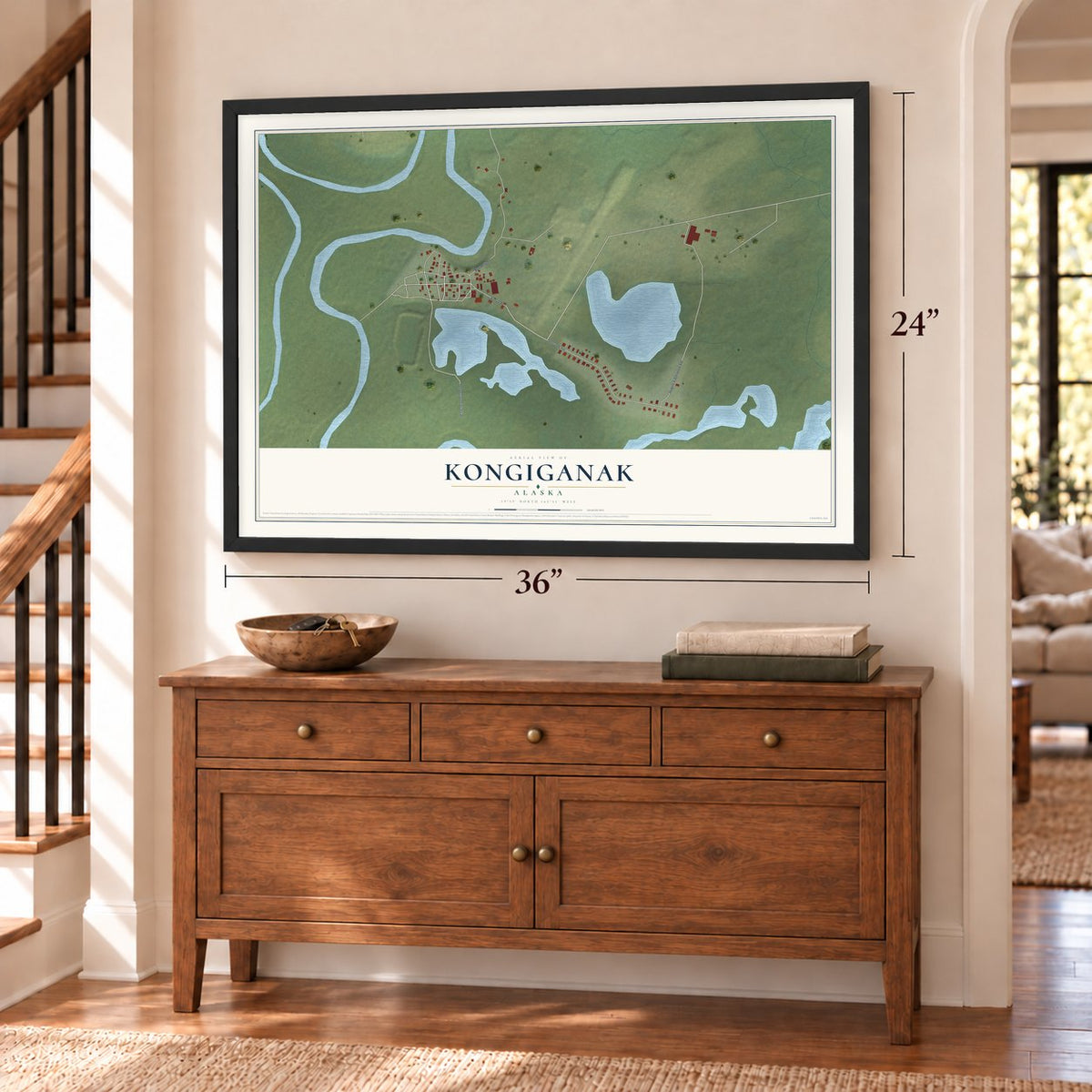 Kongiganak, Alaska map, 24 x 36 inch print in a black frame above a dresser by a staircase
